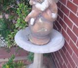 sleeping angel on bird bath