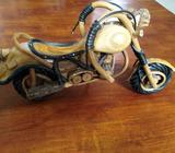 wooden motorbike statue