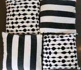 4 x black & white patterned cushions