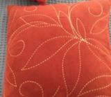 2 faux suede cushions