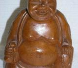 Happy, laughing buddha carved in teak wood from Thailand