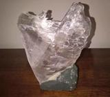 Schist specimen about 15cm high mounted on a firm grey base on$22