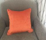4 orange velvet cushions