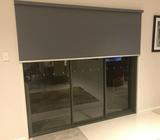 Large grey roller blinds
