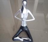 Meditating figurine