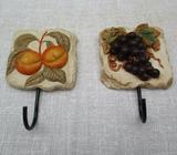 Two coat hooks with fruit design