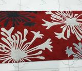 Red,white,black and grey floral rectangular carpet