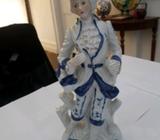 Blue and white ceramic figurine