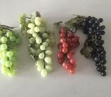 Artificial plastic bunches of grapes