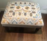 Embroidered footstool