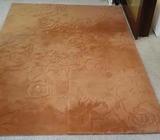 Thick orange rug / carpet
