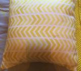Adair's yellow cushion