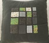 Beaded green cushion