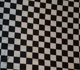 10m x 1.2m of black and white checked satin fabric