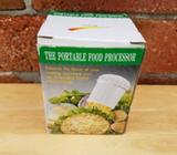 The portable food processor still in the original box