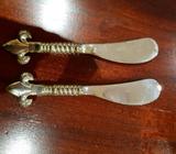 2 small Fleur De Lys Pate knives