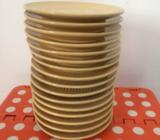 16 yellow saucers