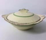 Green and cream coloured serving dish