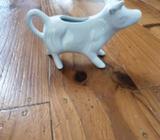 Milk jug. Cow shaped