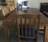 Solid dining table