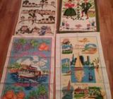 Eight brand new vintage tea towels