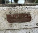 Glo Tub, concrete, perfect condition apart from the dirt