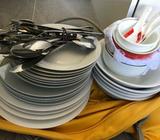 Bulk of cutlery, plates and bowls