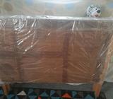 Baby's cot still new in plastic