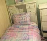 Single bed with shelves