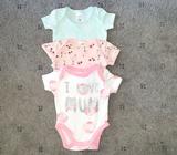 NEWBORN BODYSUITS