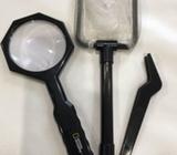 Magnifying glass, net and tweezers