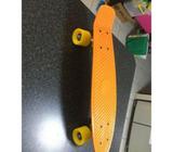 Orange Penny skateboard