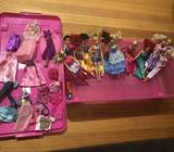 Barbie dolls and travel case including clothes
