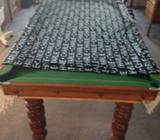 Blanket with Charlie printed on it