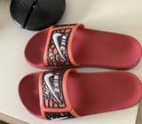 Nike red slides - great condition- size 7 and a half!