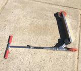 Used kids razor blade skate red big wheel