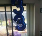 3 balloons filled with helium
