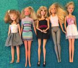 5 Barbie Dolls dressed as pictured. $20 the lot