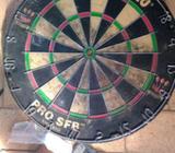 Dart board with darts